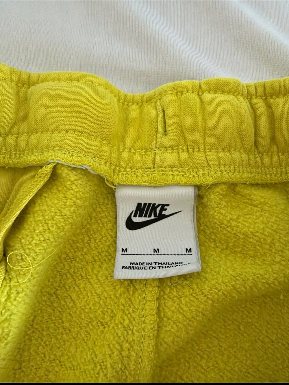 Nike Yellow Fleece Joggers with White Logo - Picture 2 of 2